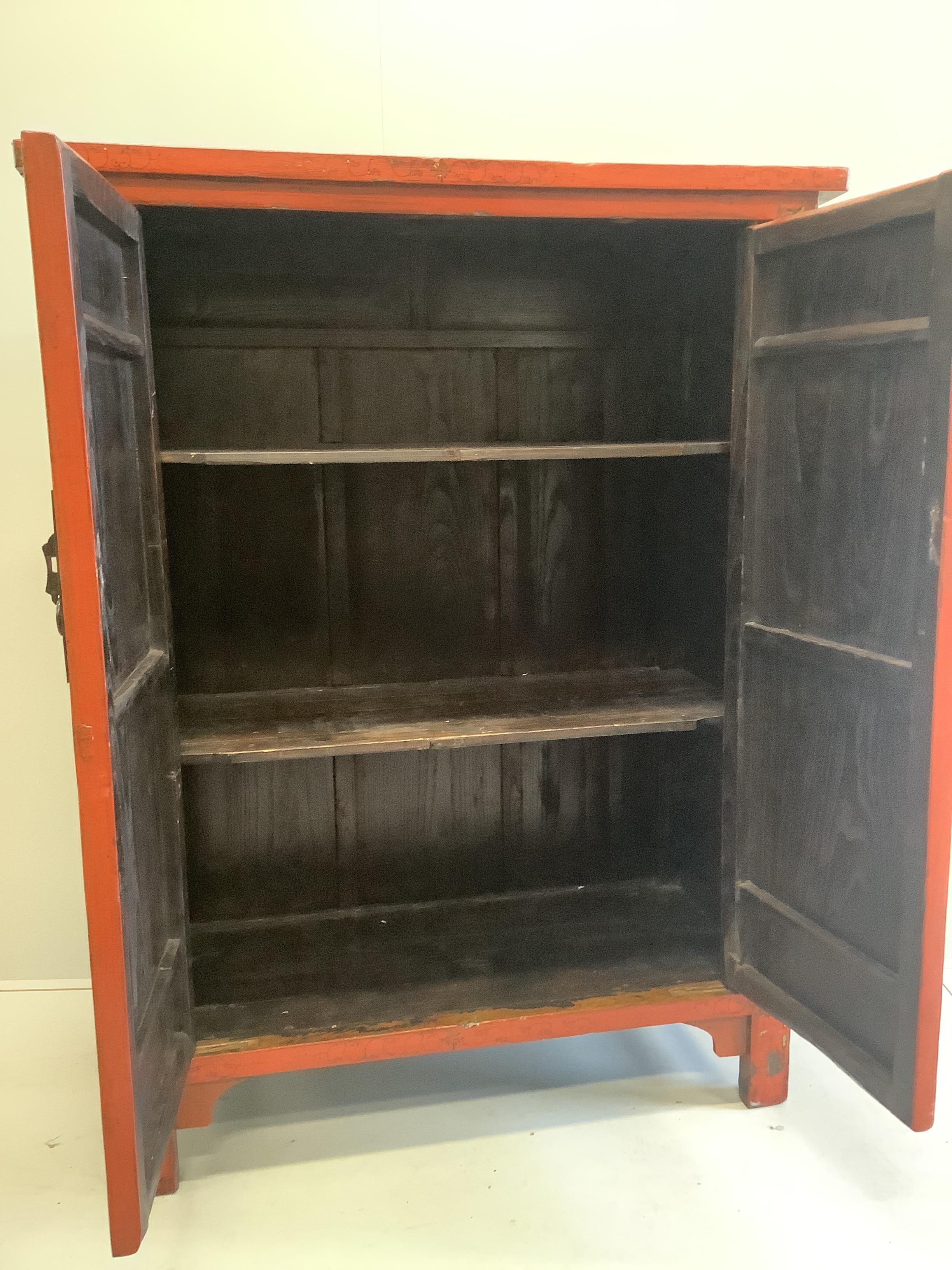 An India Jane Chinese scarlet lacquer two door cabinet, width 128cm, depth 54cm, height 167cm
